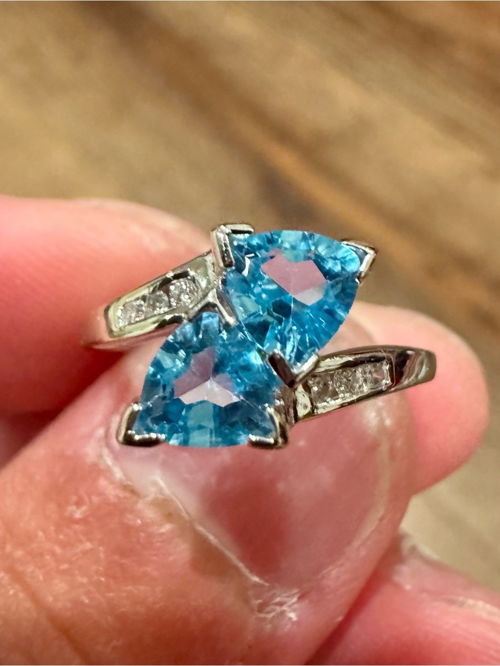 10K White Gold Blue Topaz and Diamond Bypass Ring